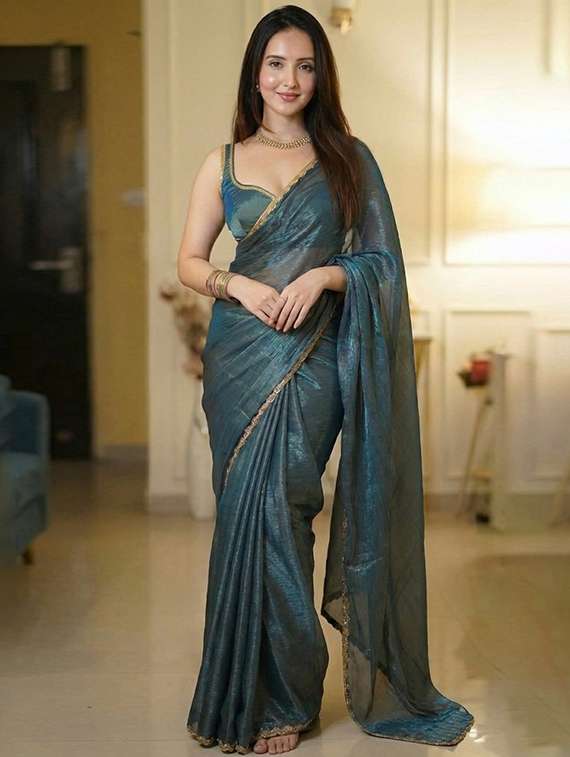 women solid with embellished bordered saree with blouse