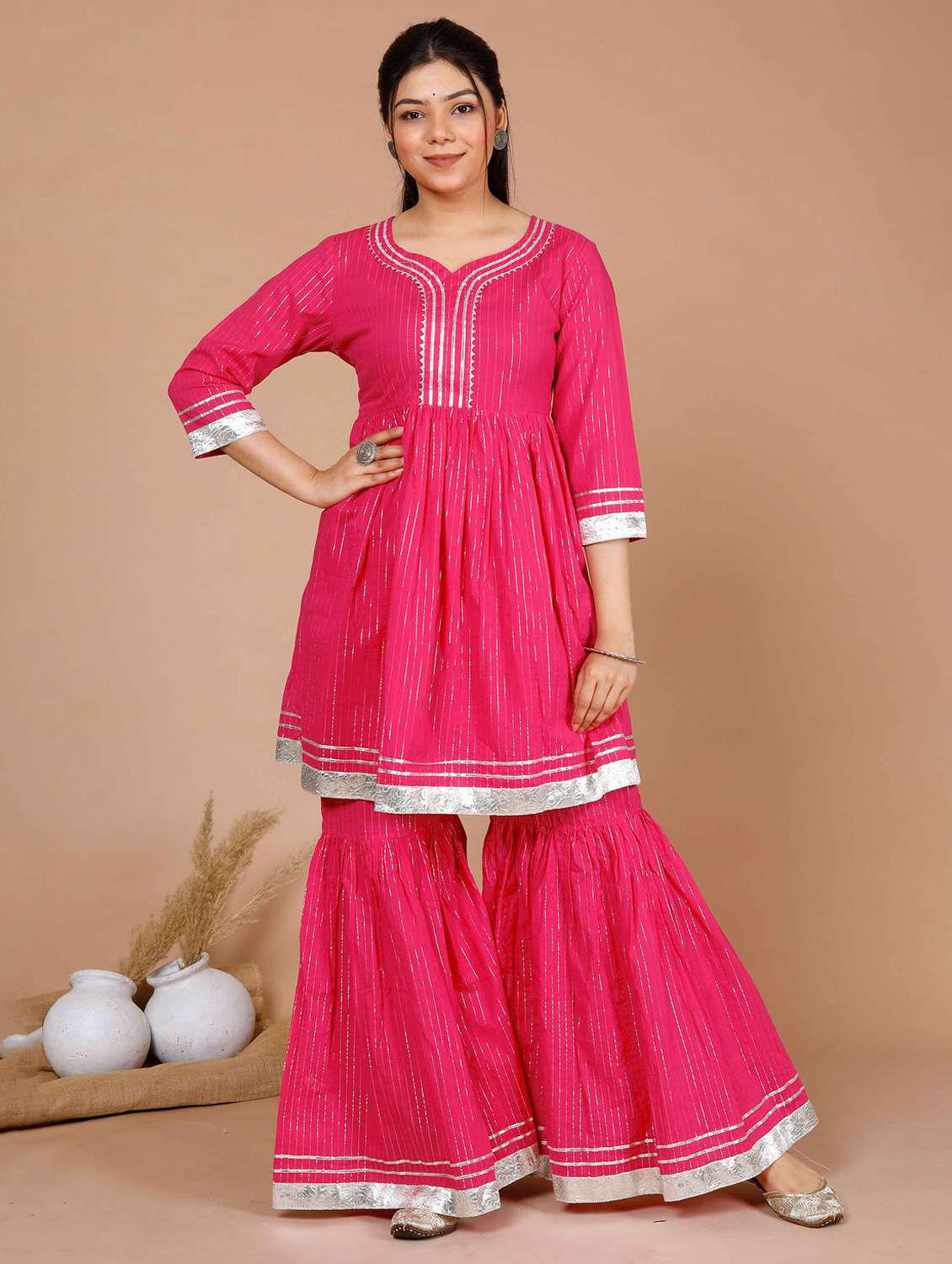 women striped three quarter sleeve kurta sharara set