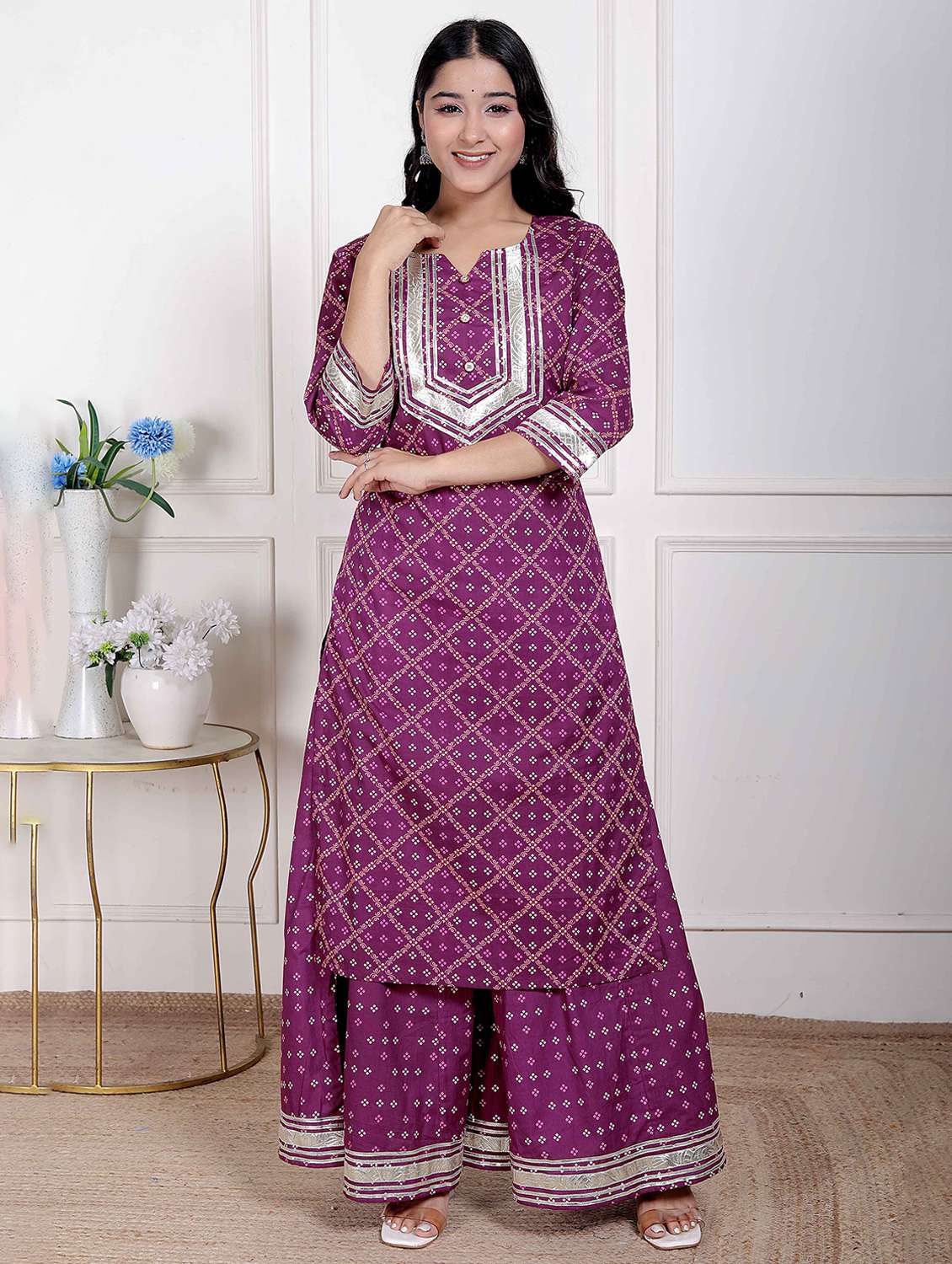 women bandhani three quarter sleeve kurta palazzo set