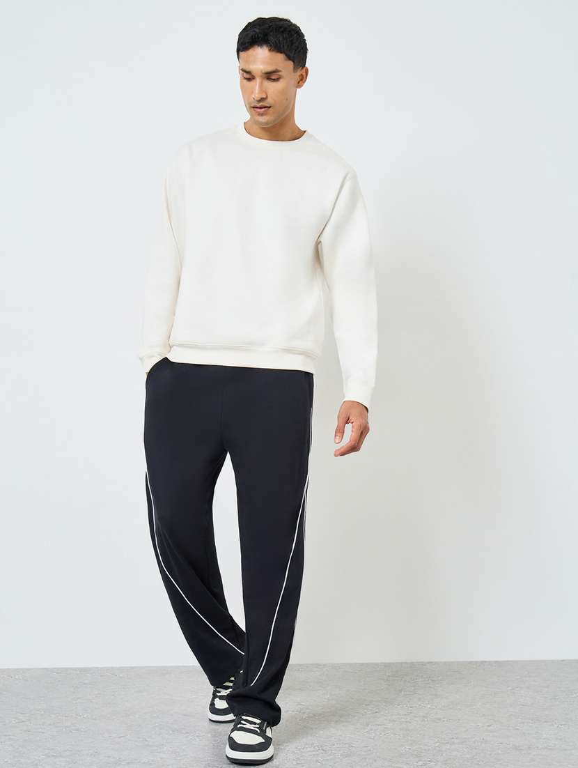 men solid mid rise relaxed fit track pant - 22287903 -  Standard Image - 2