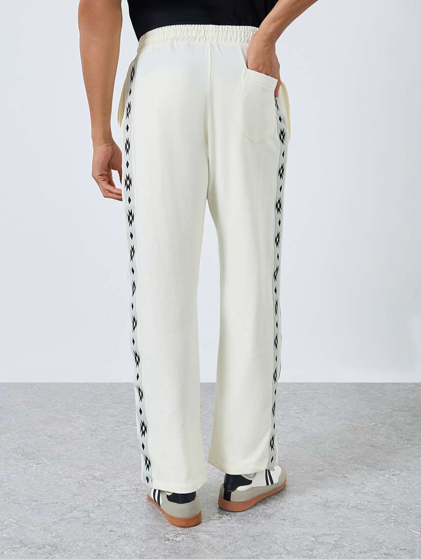 men solid mid rise relaxed fit track pant - 22287904 -  Standard Image - 2