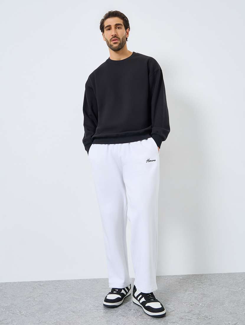 men solid mid rise relaxed fit track pant - 22287905 -  Standard Image - 2