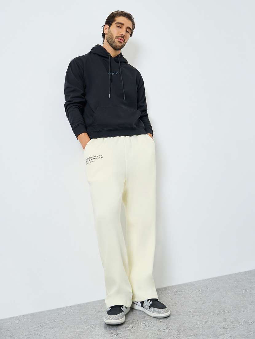 men solid mid rise relaxed fit track pant - 22287908 -  Standard Image - 2