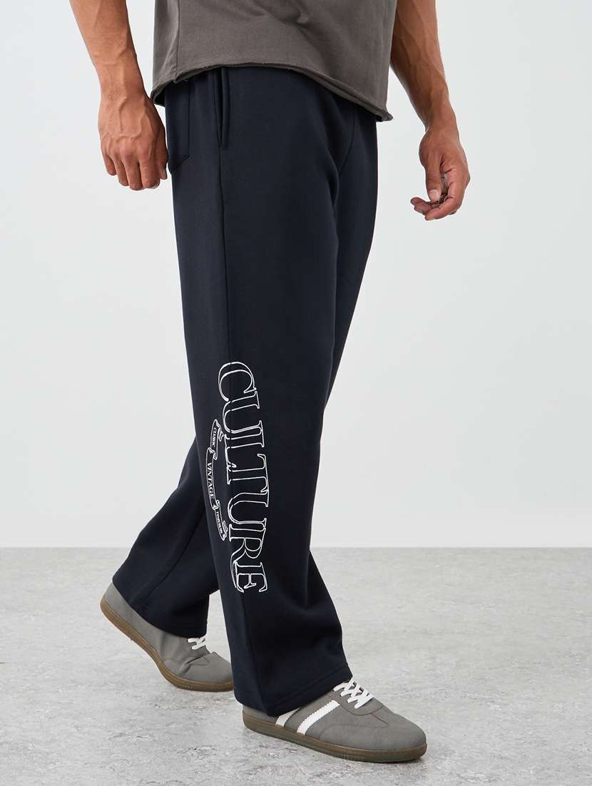 men printed mid rise relaxed fit track pant