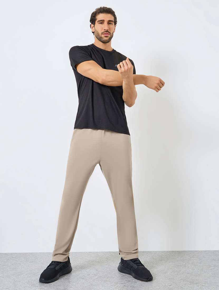 men solid mid rise regular fit track pant - 22287917 -  Standard Image - 2