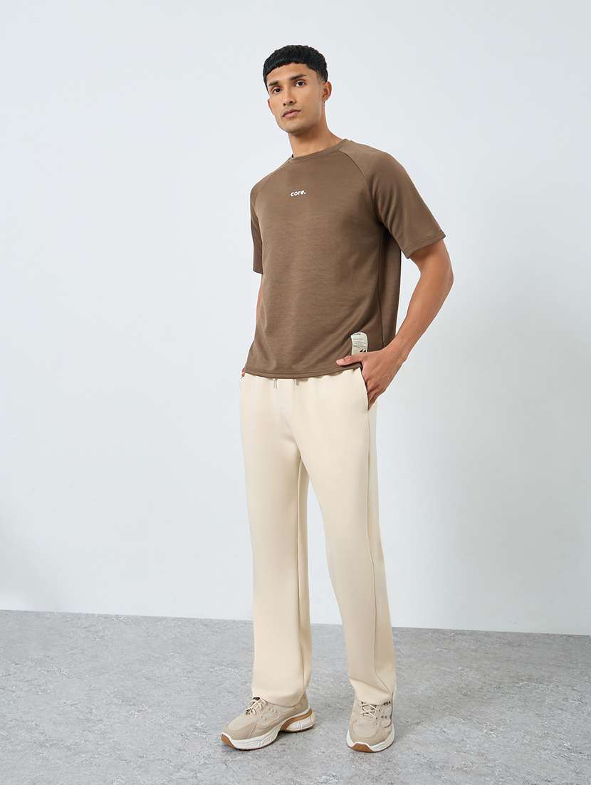 men solid mid rise regular fit track pant - 22287920 -  Standard Image - 2