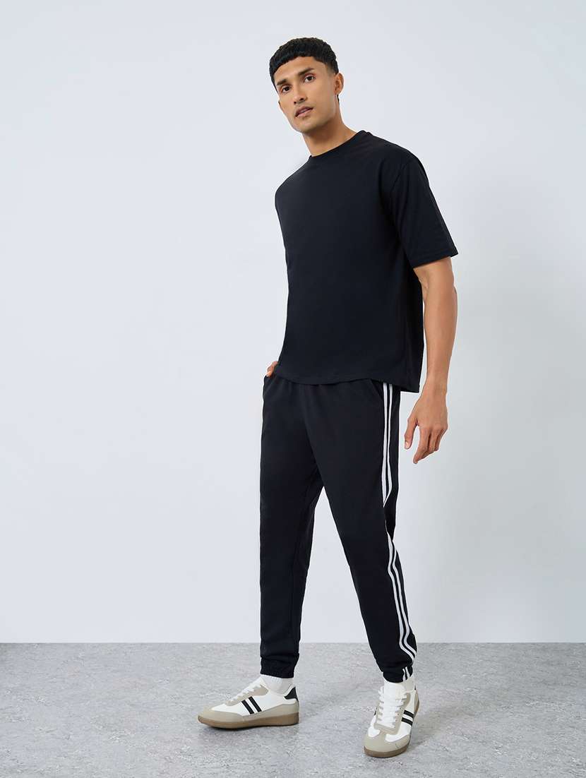 men solid mid rise regular fit jogger - 22287921 -  Standard Image - 2