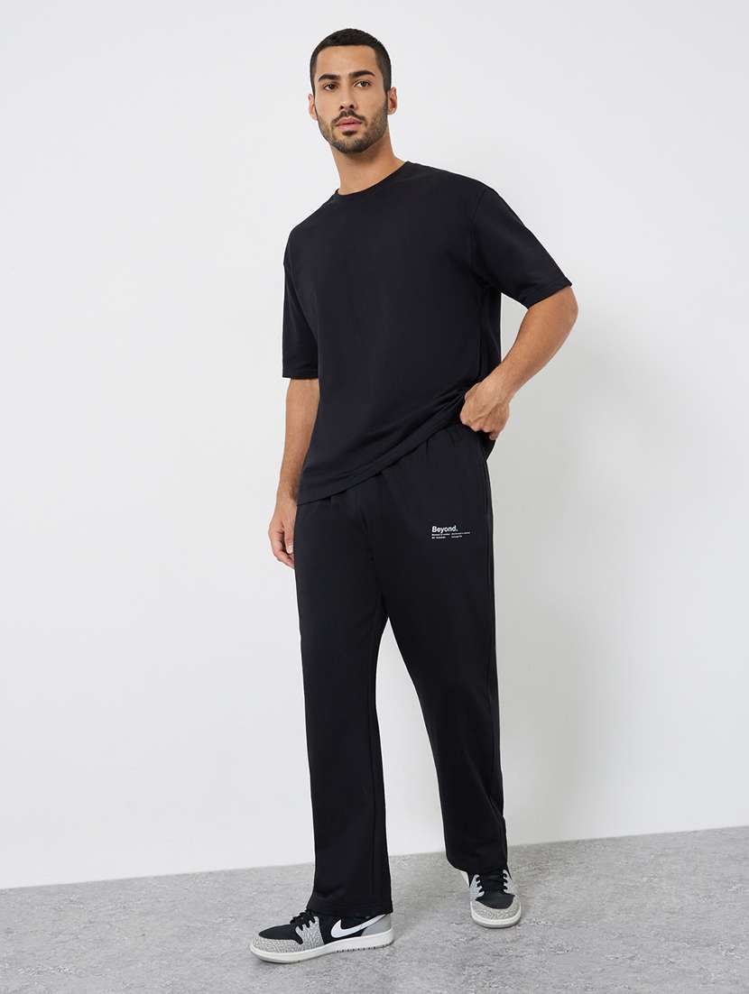 men solid mid rise relaxed fit track pant - 22287960 -  Standard Image - 2