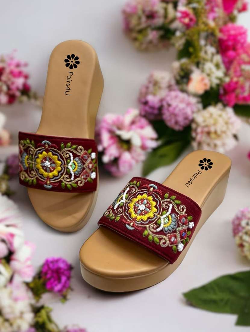 women embroiderd slip on wedge