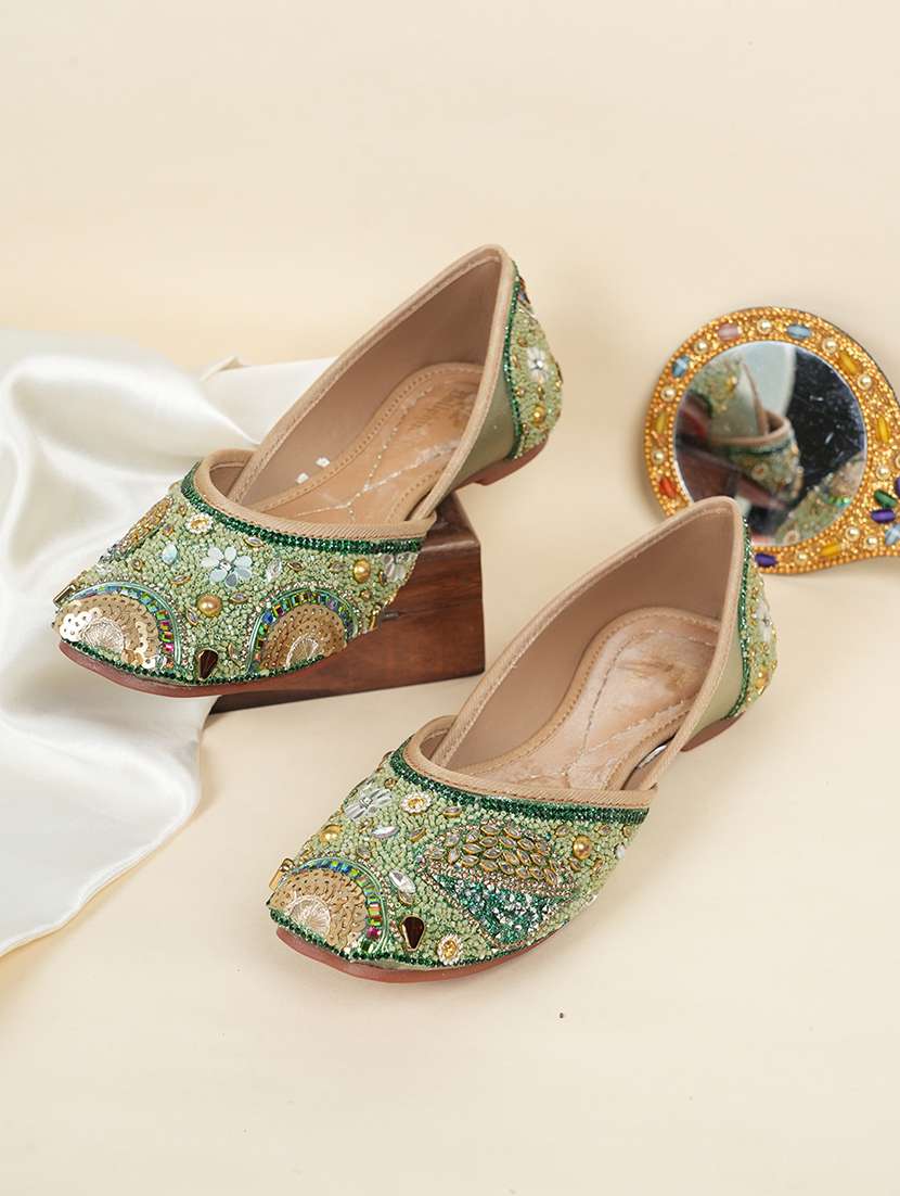 women embellished slip on mojari