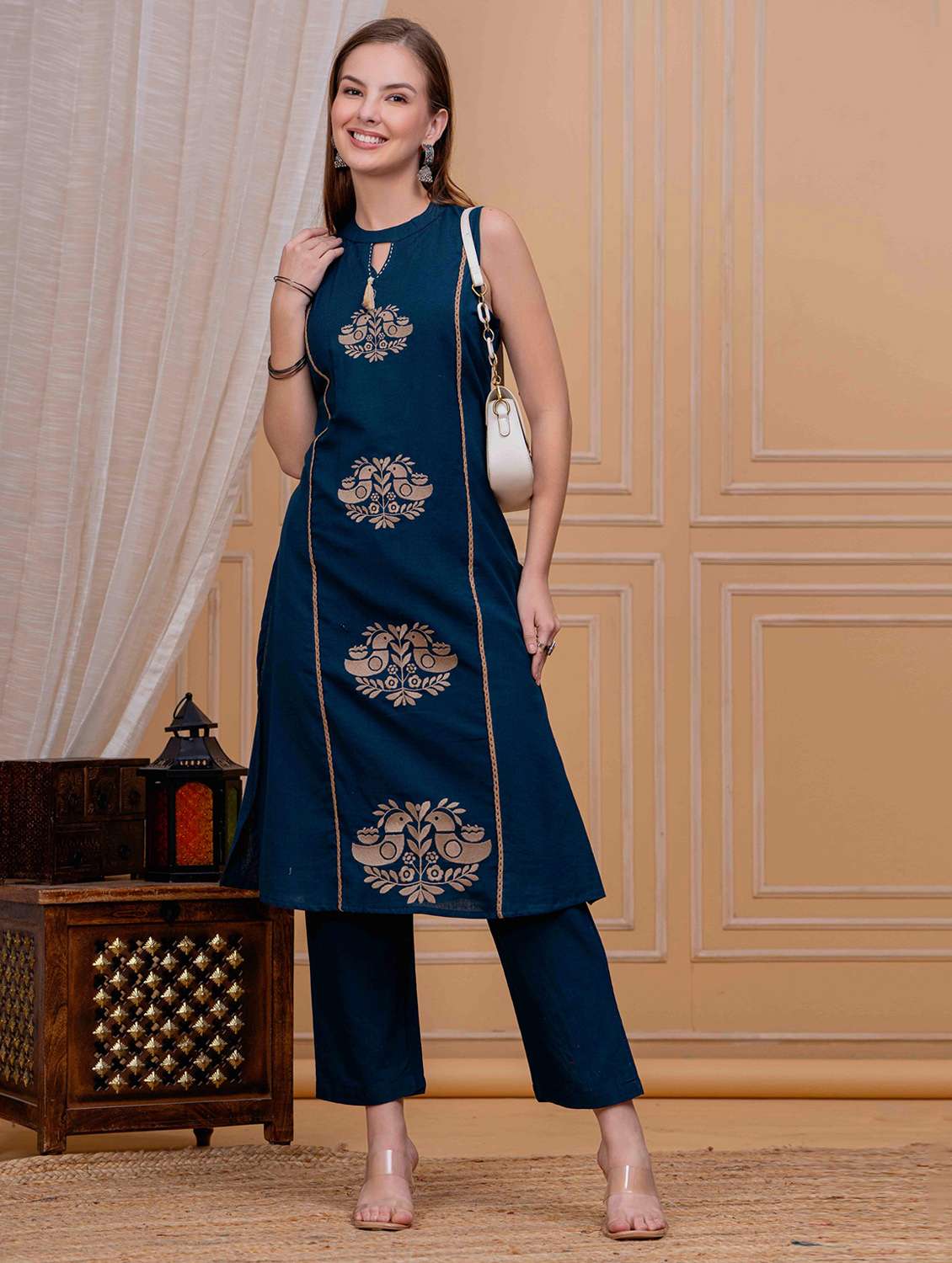 women solid with work sleeveless kurta with pant set