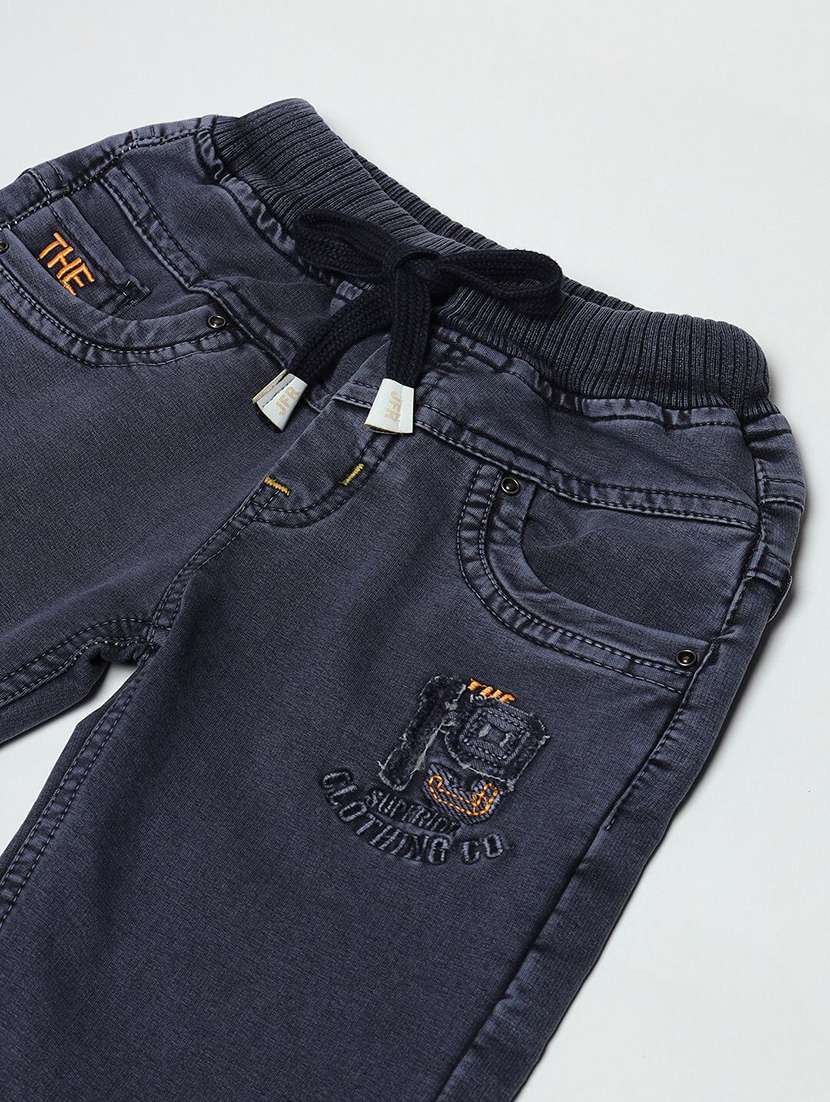 boys solid mid rise relaxed fit jean - 22300670 -  Standard Image - 2