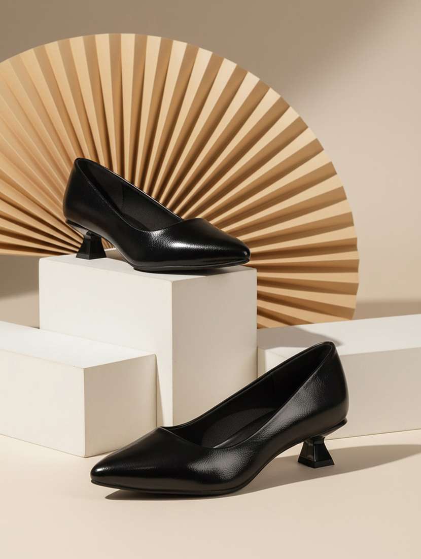 women black solid slip on pump