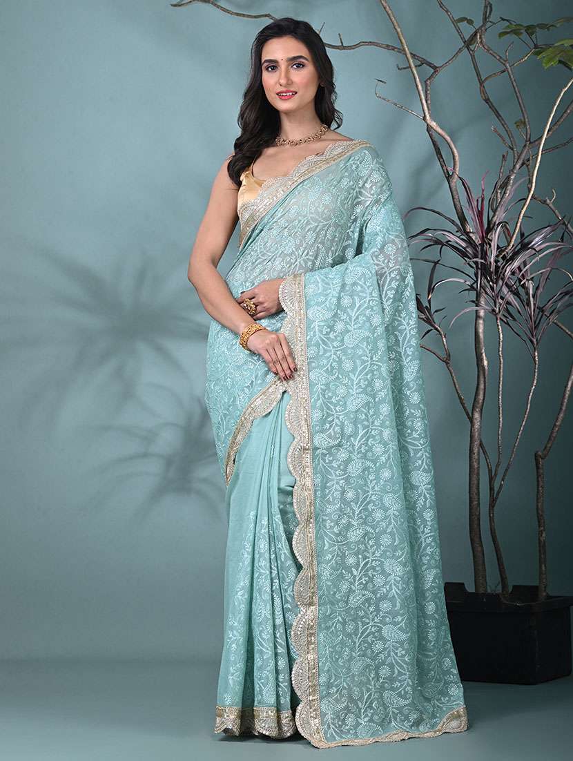 women solid with work embroidered saree with blouse
