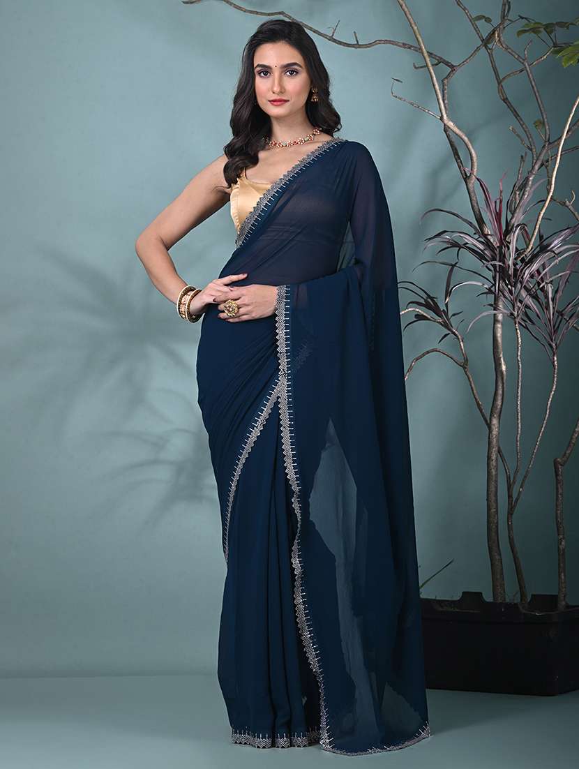 women solid with embellished bordered saree with blouse