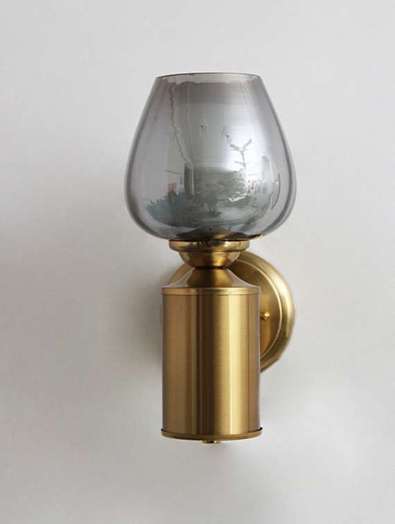vintage brass wall light with smoked glass globe - 22316244 -  Standard Image - 2
