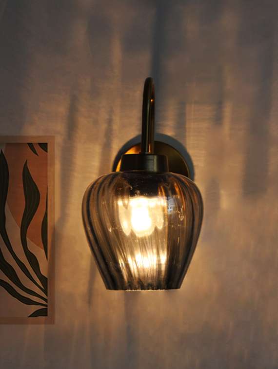 elegant smokey grey glass wall light with curved holder - 22316777 -  Standard Image - 2