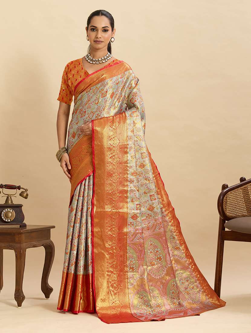 women self design banarasi saree with blouse