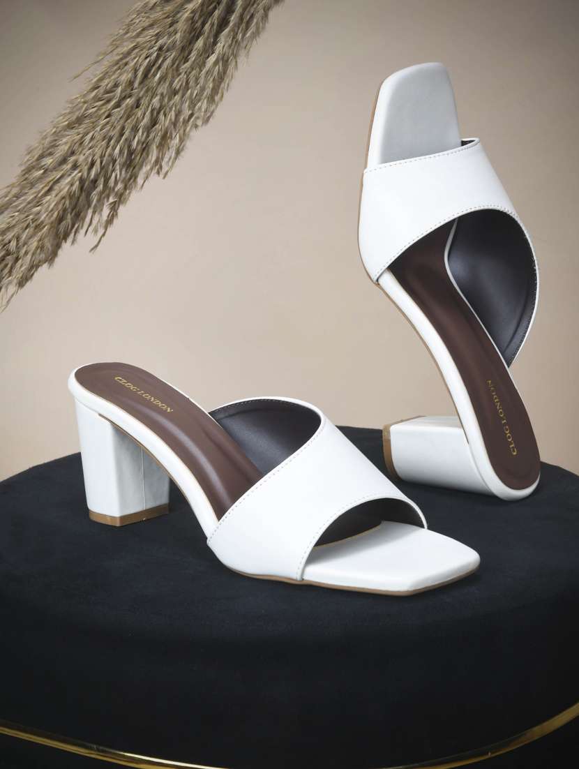 women off white slip on sandal