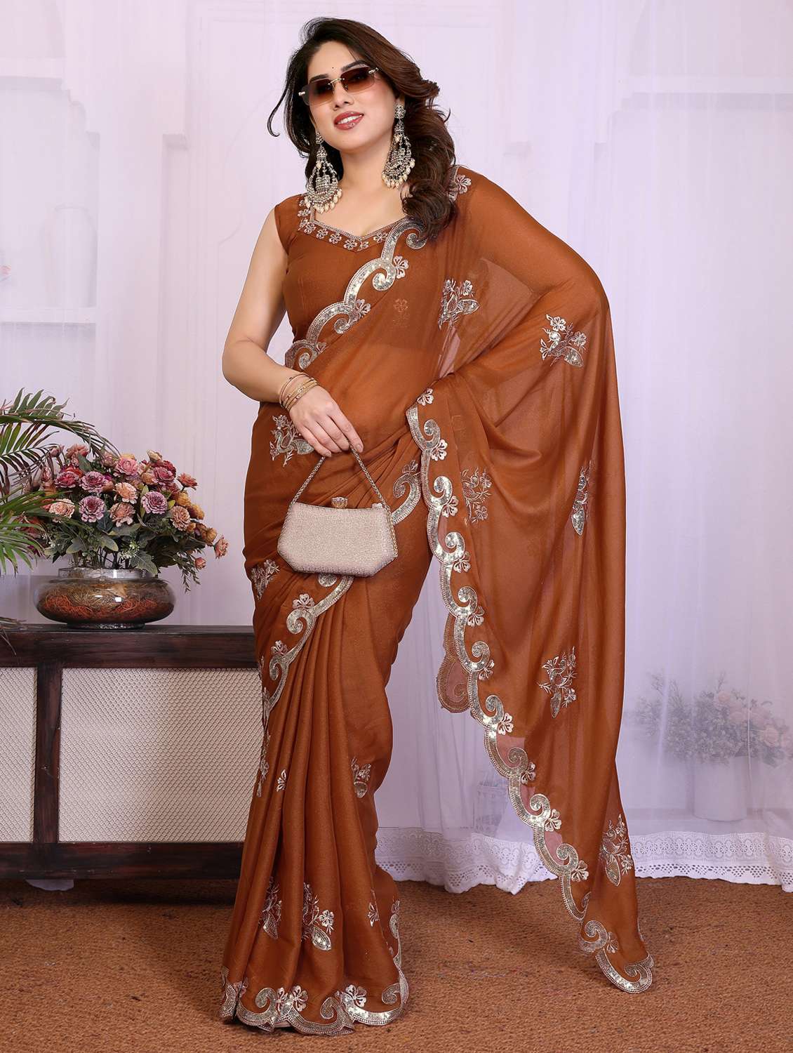 women solid with work embroidered saree with blouse