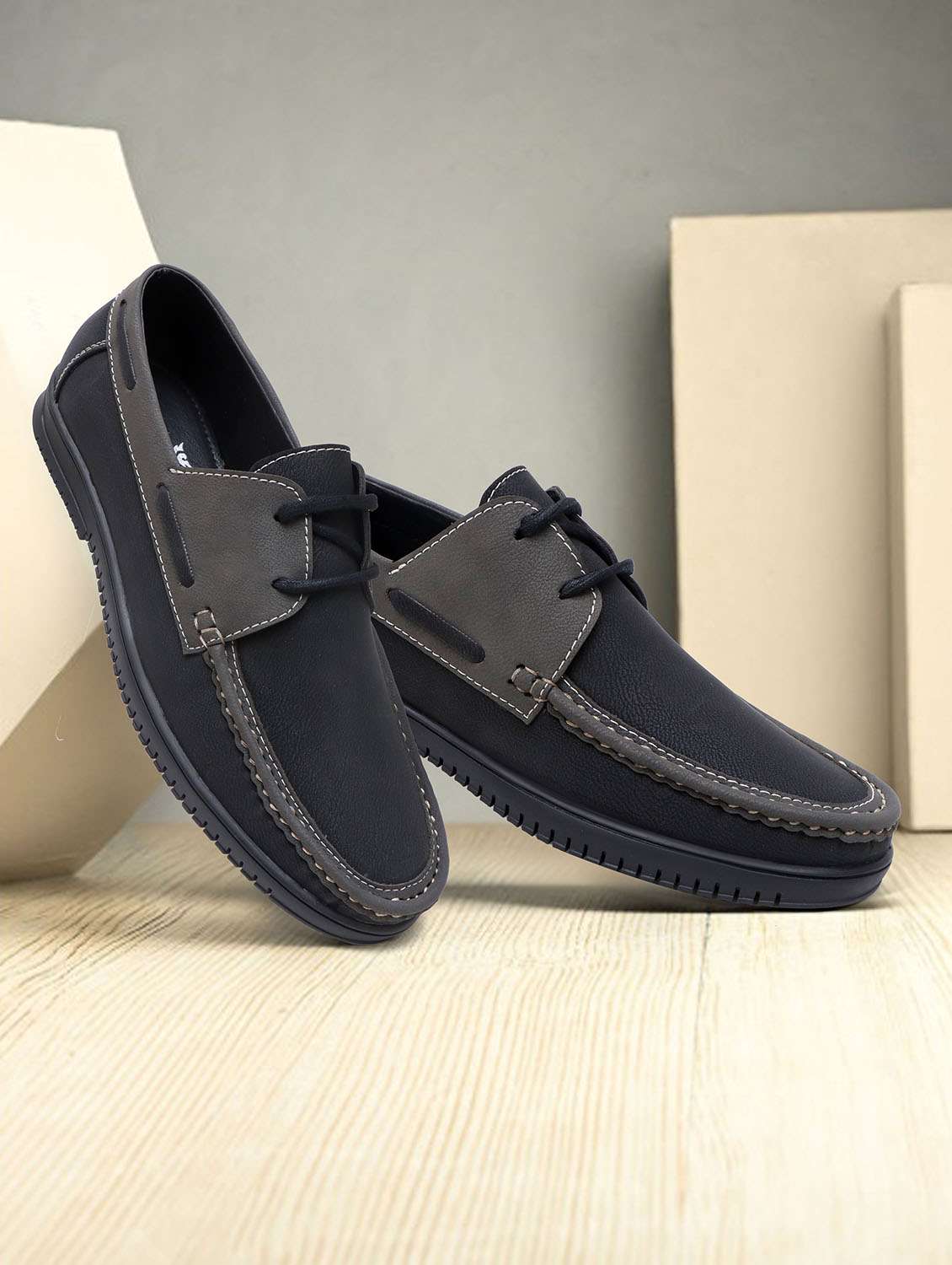 men black slip on boatshoe
