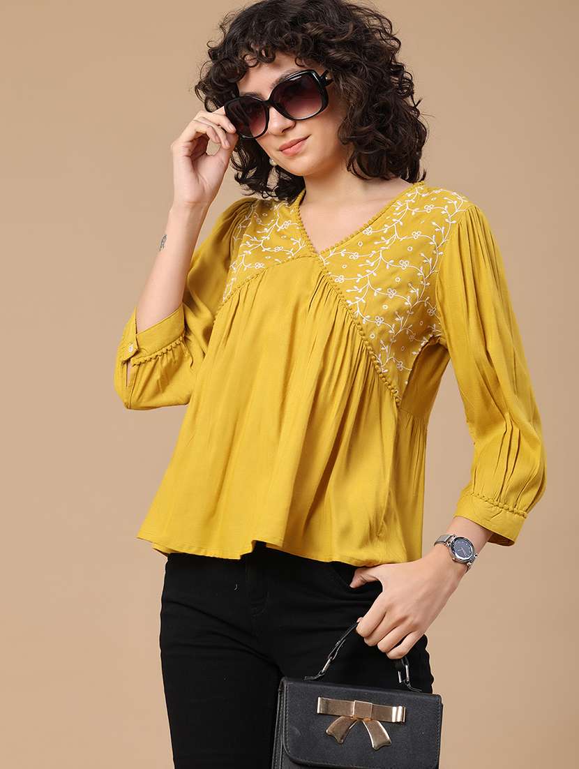 women embroidered v neck flared top