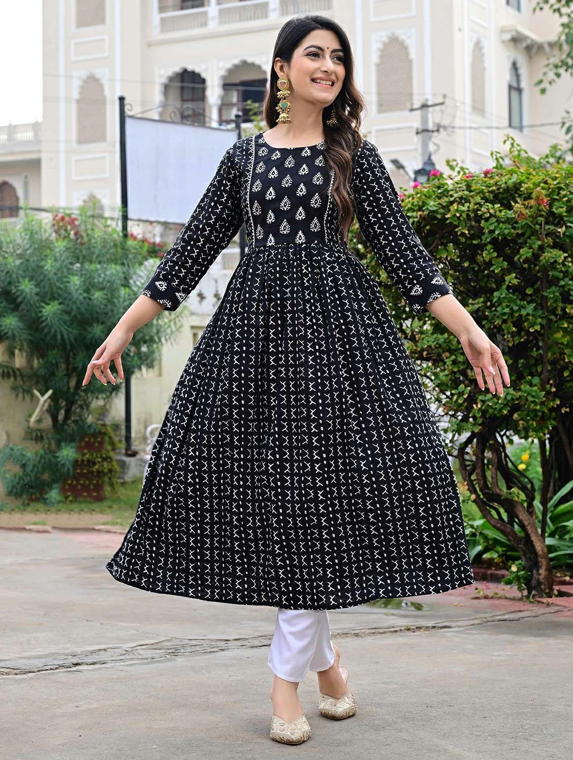 women printed three quarter sleeve a-line kurta