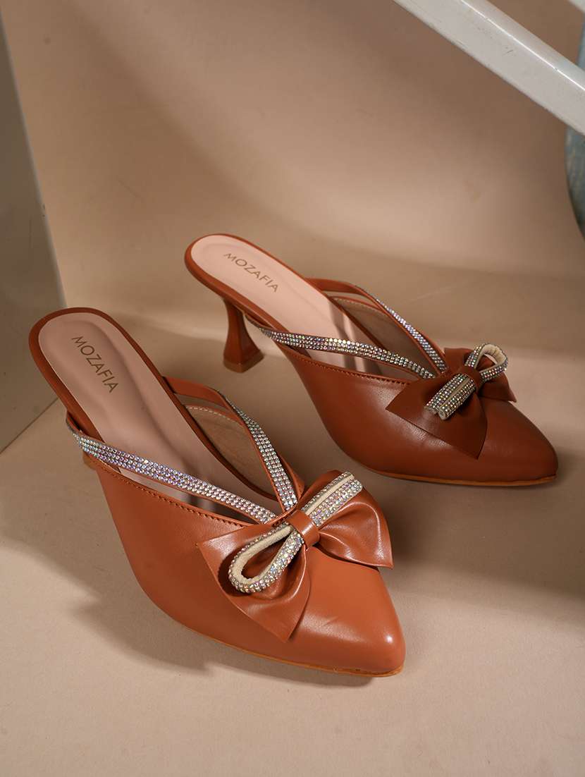 women embellished slip on mules