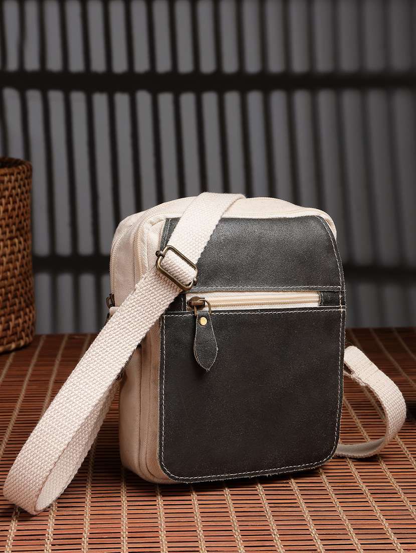 women solid sling bag with adjustable strap