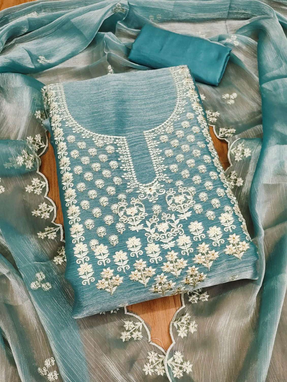 women solid with work unstitched suit set