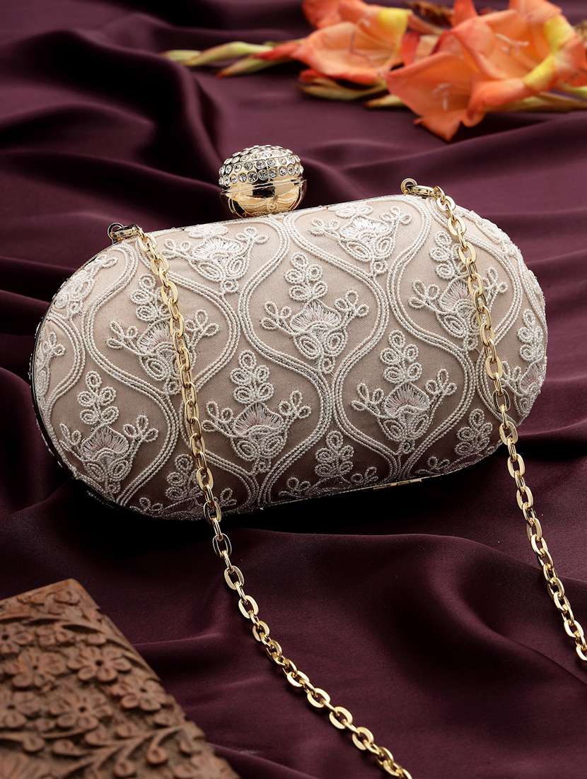women embroidered clutch with sling chain