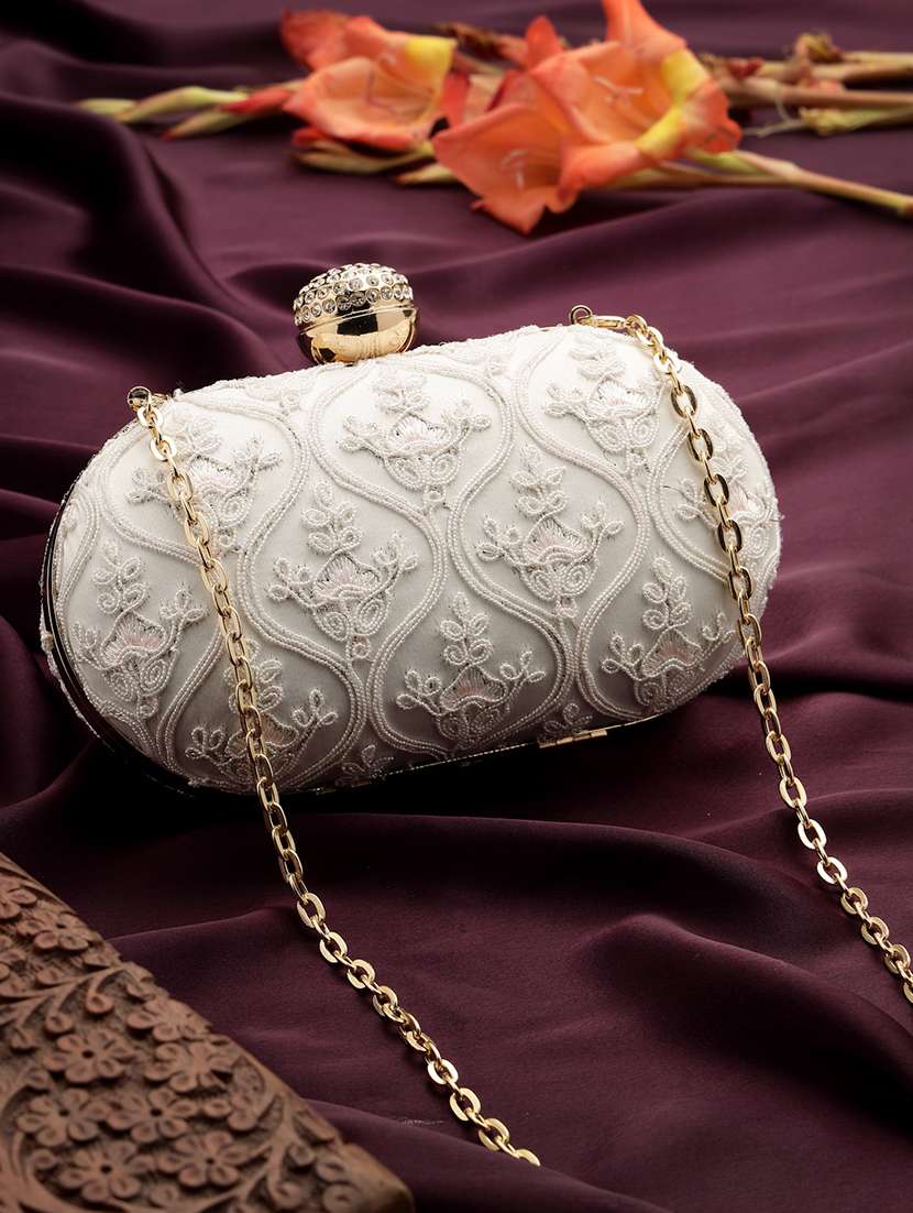women embellished clutch with sling chain