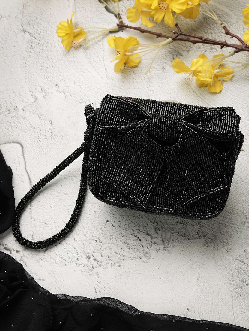 women embellished clutch with strap