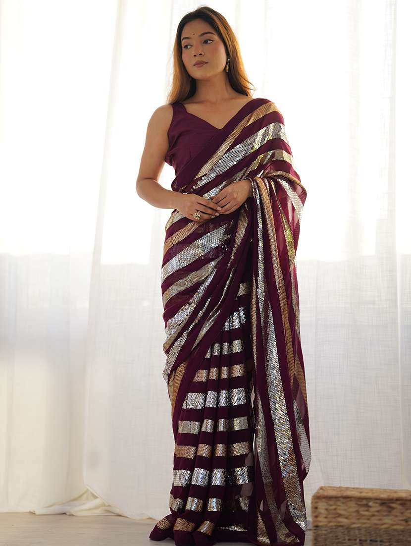women solid with work embellished saree with blouse