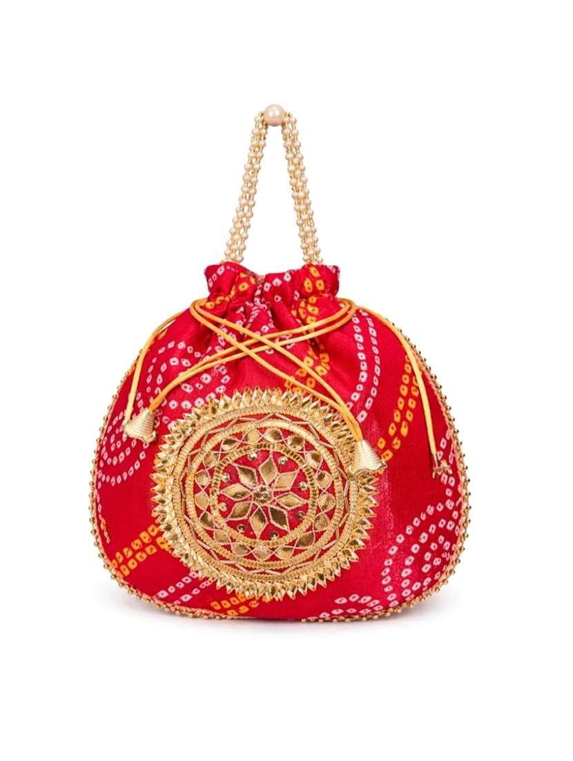 women embellsihed potli bag - 22373605 -  Standard Image - 2