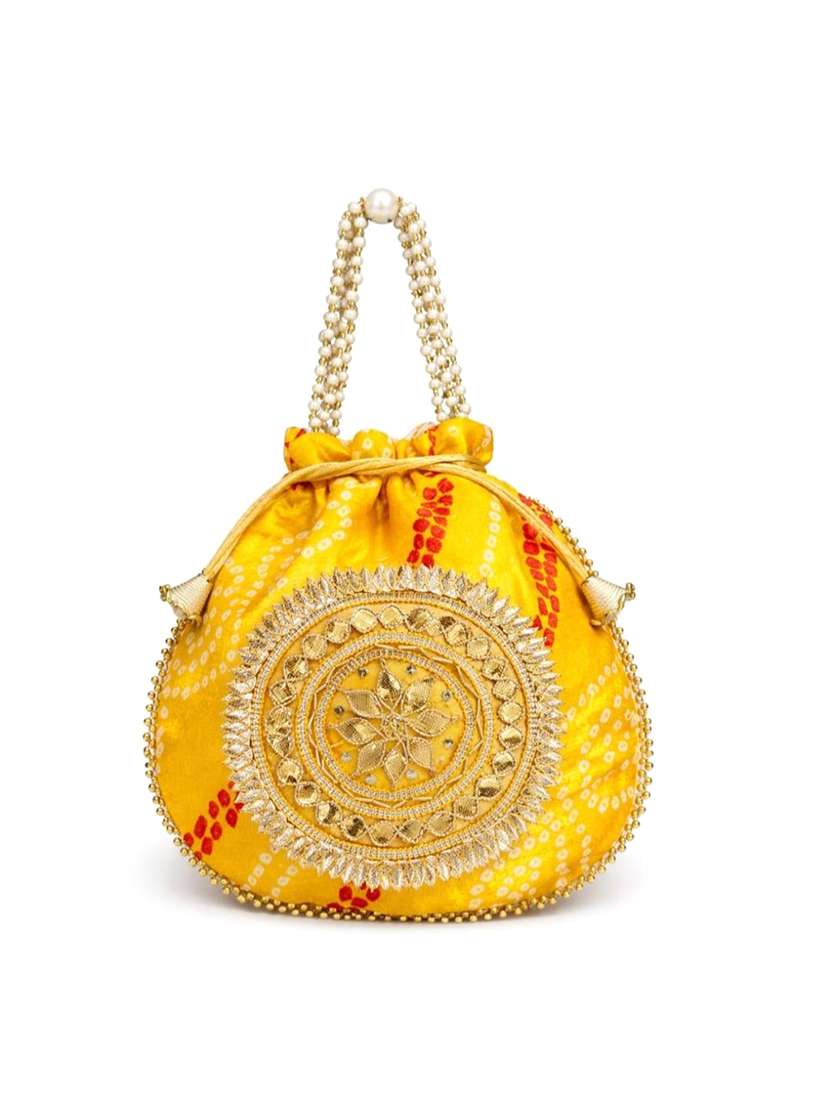 women embellsihed potli bag - 22373606 -  Standard Image - 2