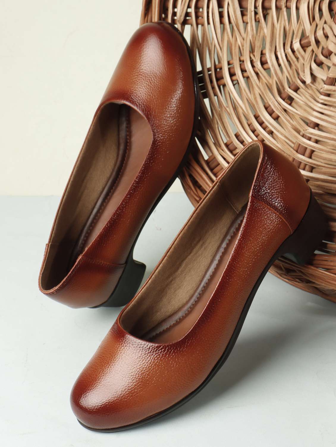 women tan slip on pump