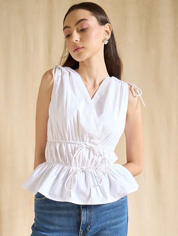 women solid sleeveless peplum top