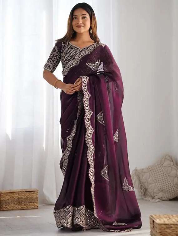 women solid with work embroidered saree with blouse