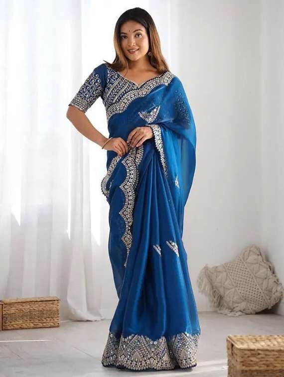 women solid with work embroidered saree with blouse