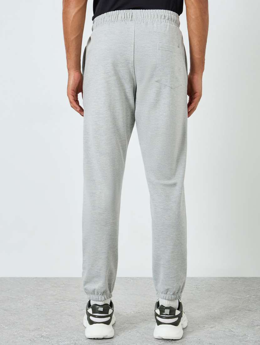 men solid mid rise relaxed fit jogger - 22394909 -  Standard Image - 2