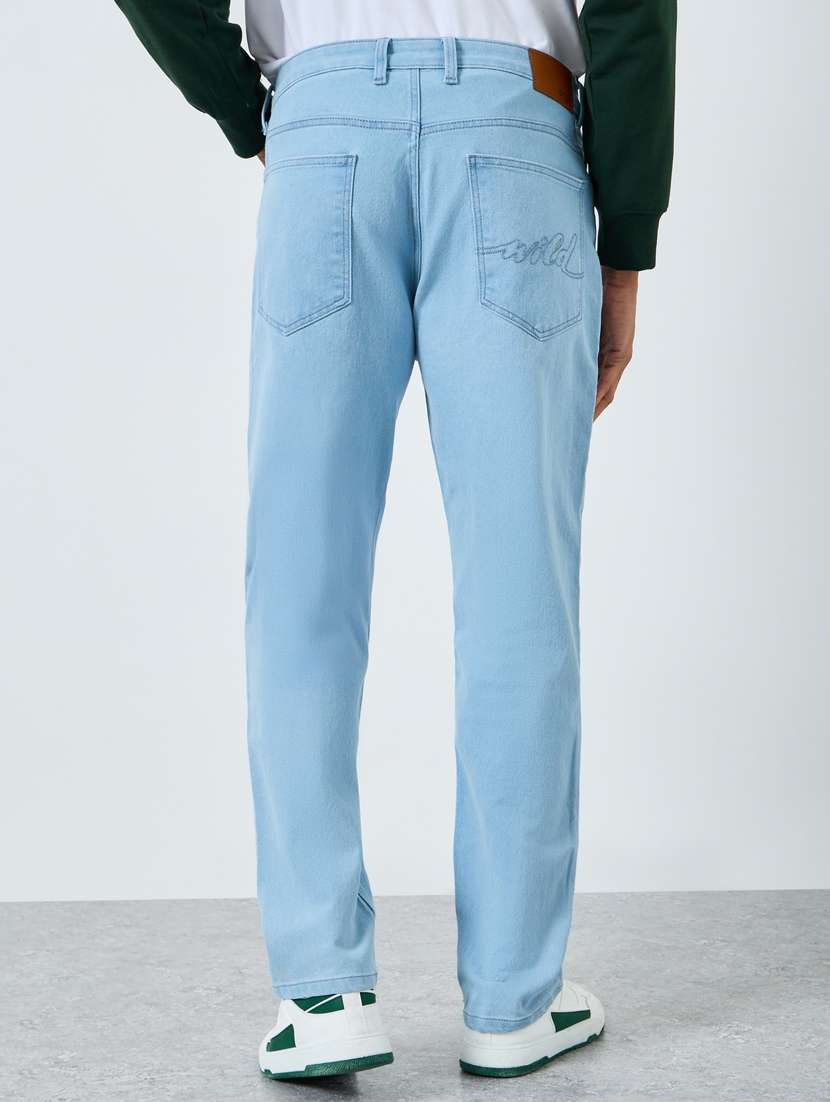 men plain mid rise full length tapered jeans - 22397961 -  Standard Image - 2