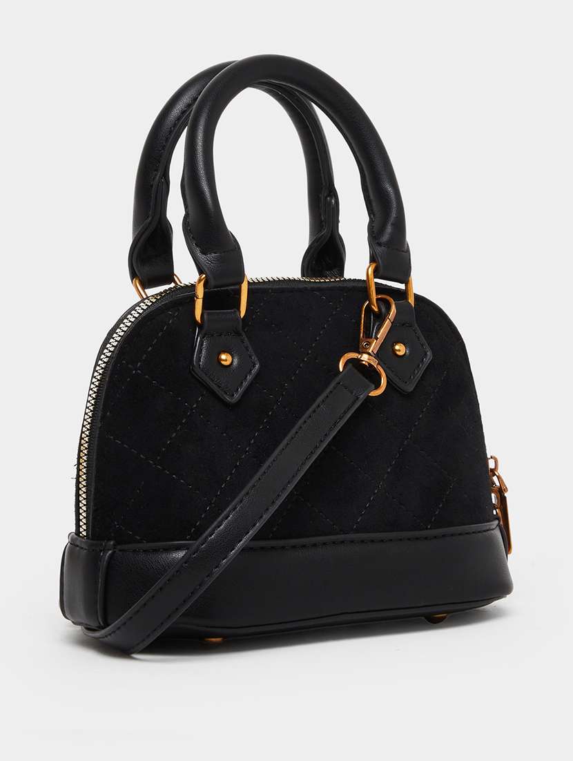 women black textured handbag