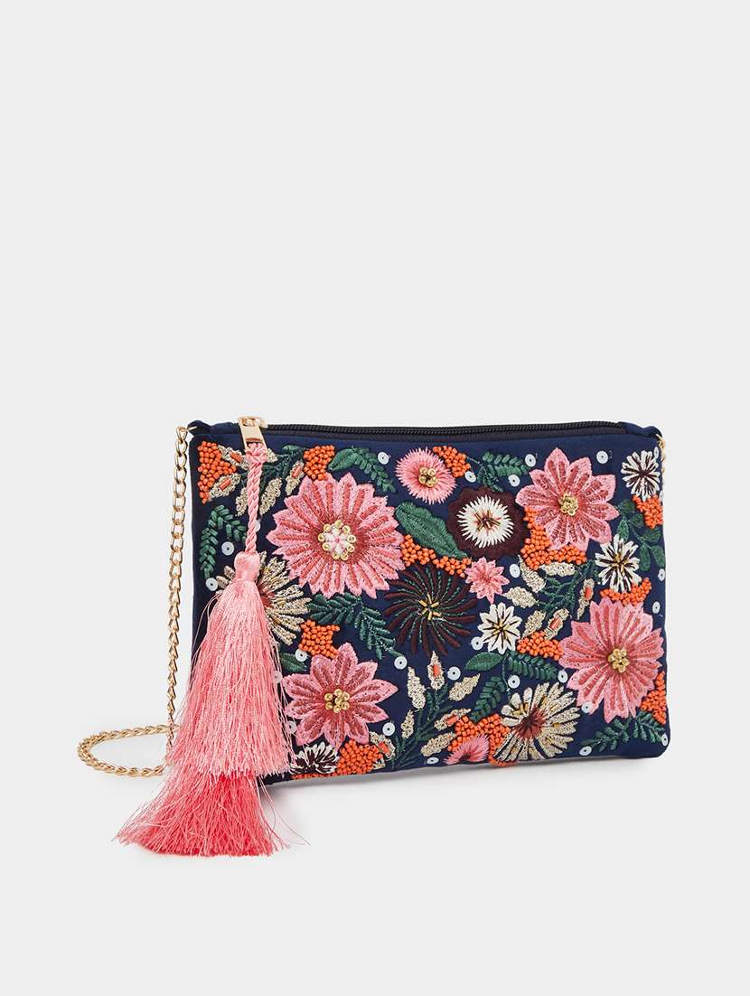 blue embroidered clutch bag with tassel
