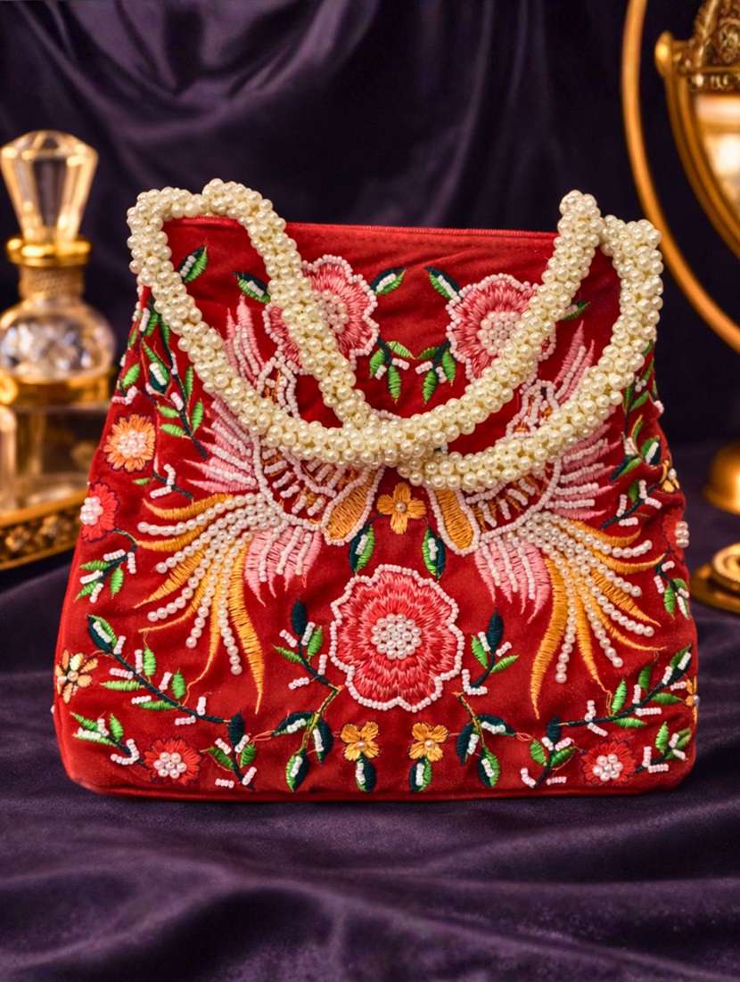 women solid with work embroidered potli