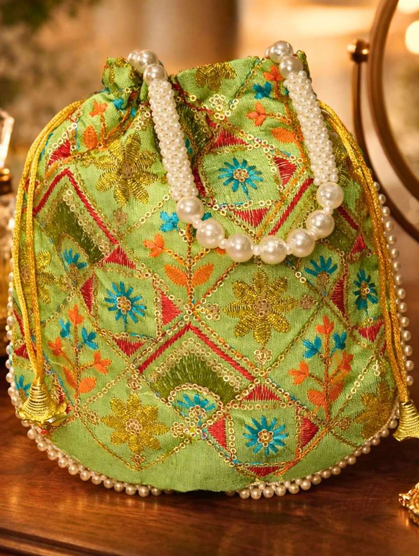 women solid with work embroidered potli