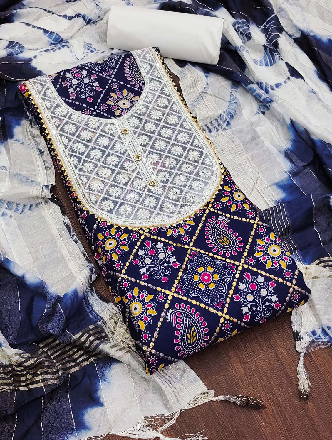 women printed unstitched suit set