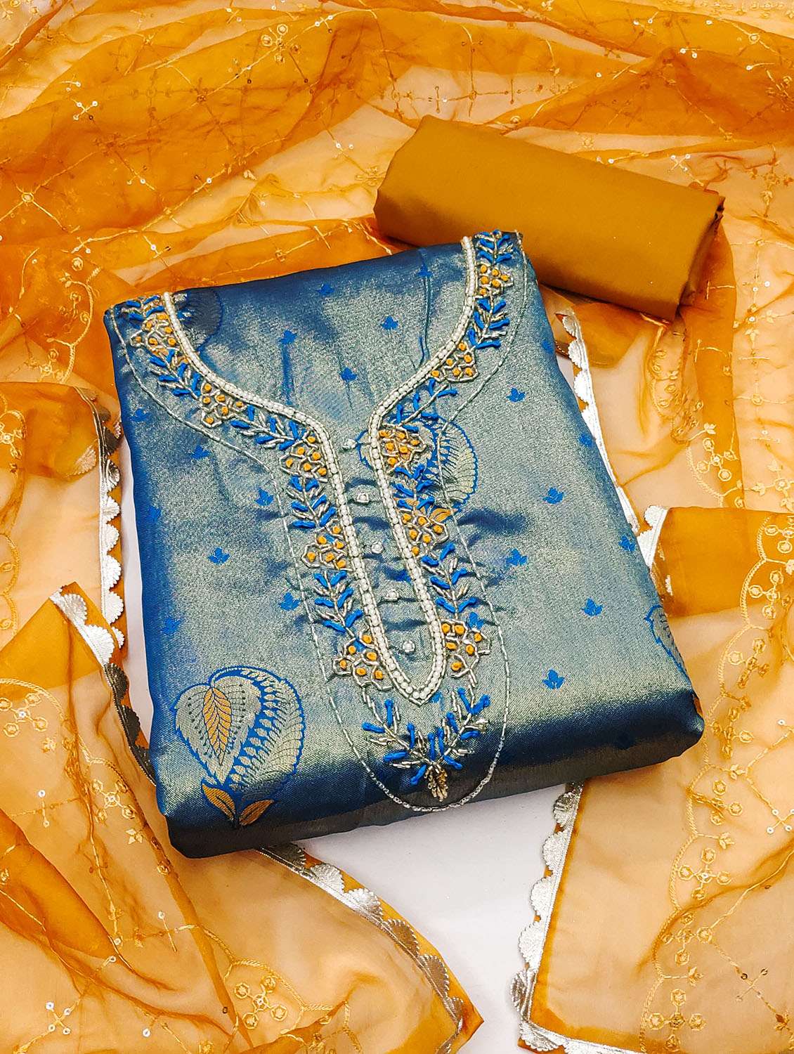 women self design unstitched suit set