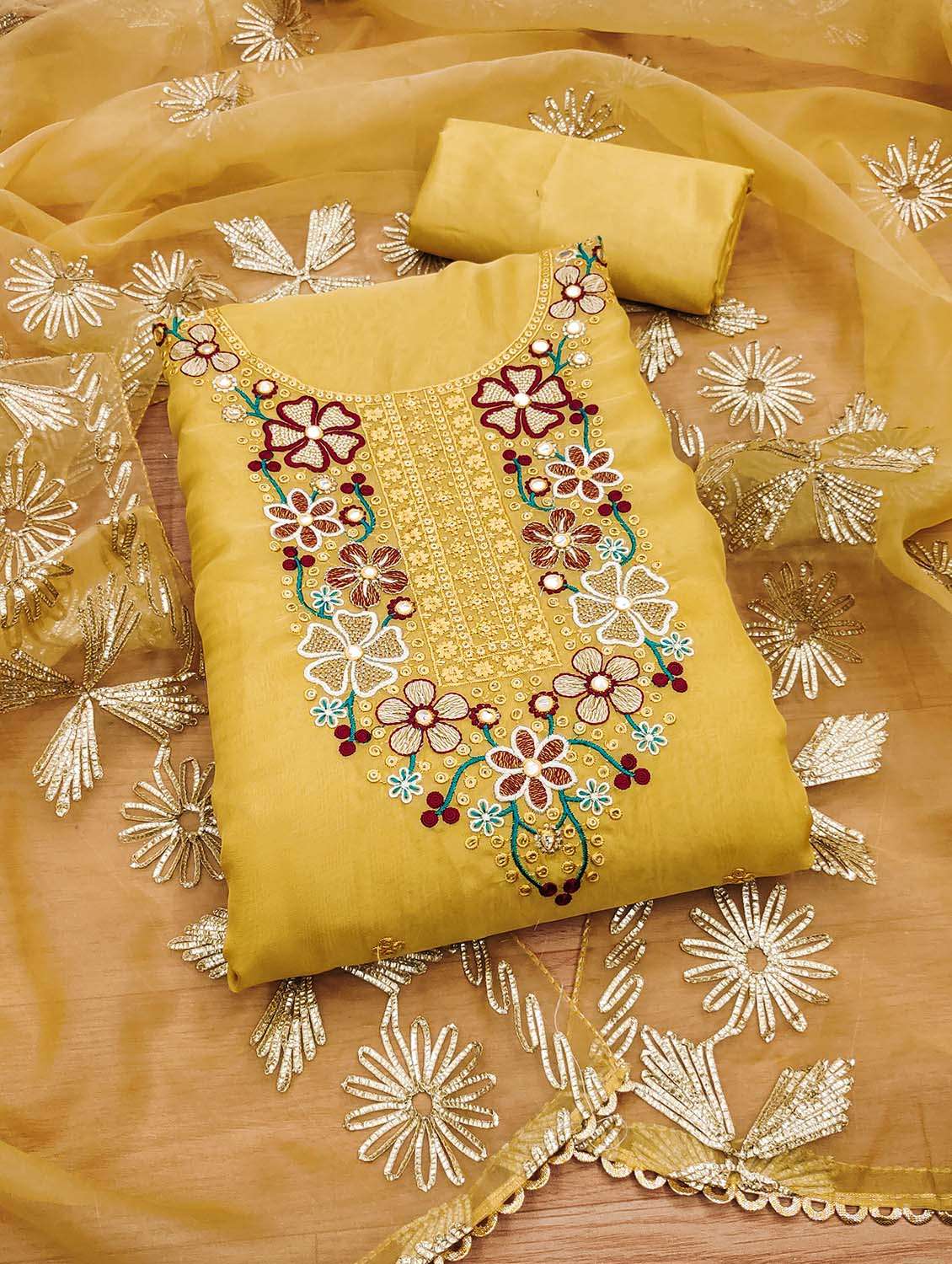 women solid with work unstitched suit set