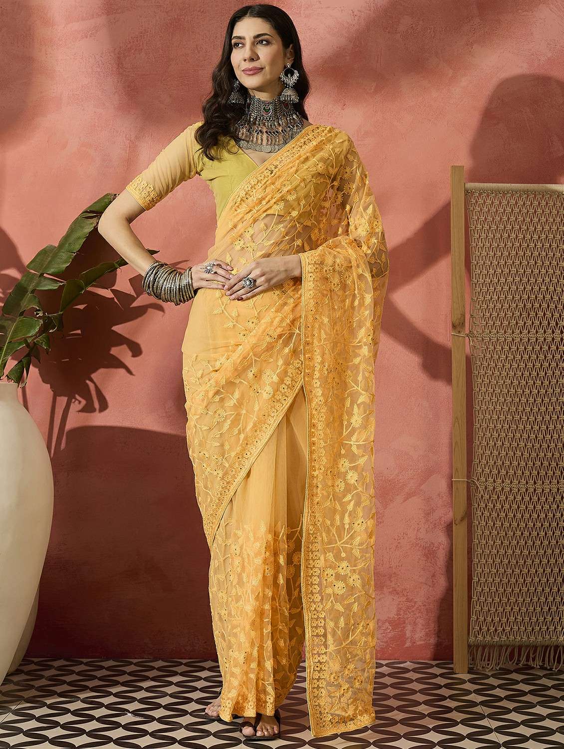 women solid with work embroidered saree with blouse